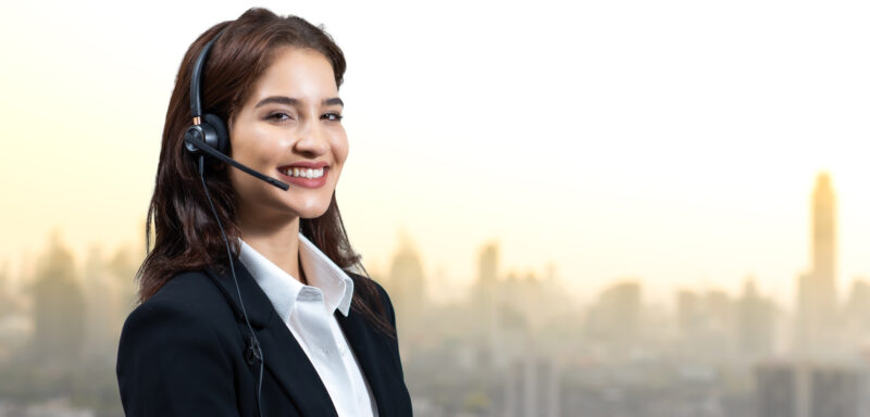 attractive business woman headsets are smiling while working customer service assistant working