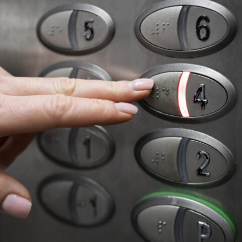 blind-person-choosing-floor-elevator